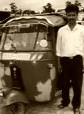 The driver of a tricycle.It is k area.This man taught the delicious store which the people from Moore manage.